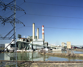 Electrical transmission lines in front of coal-fired power plant